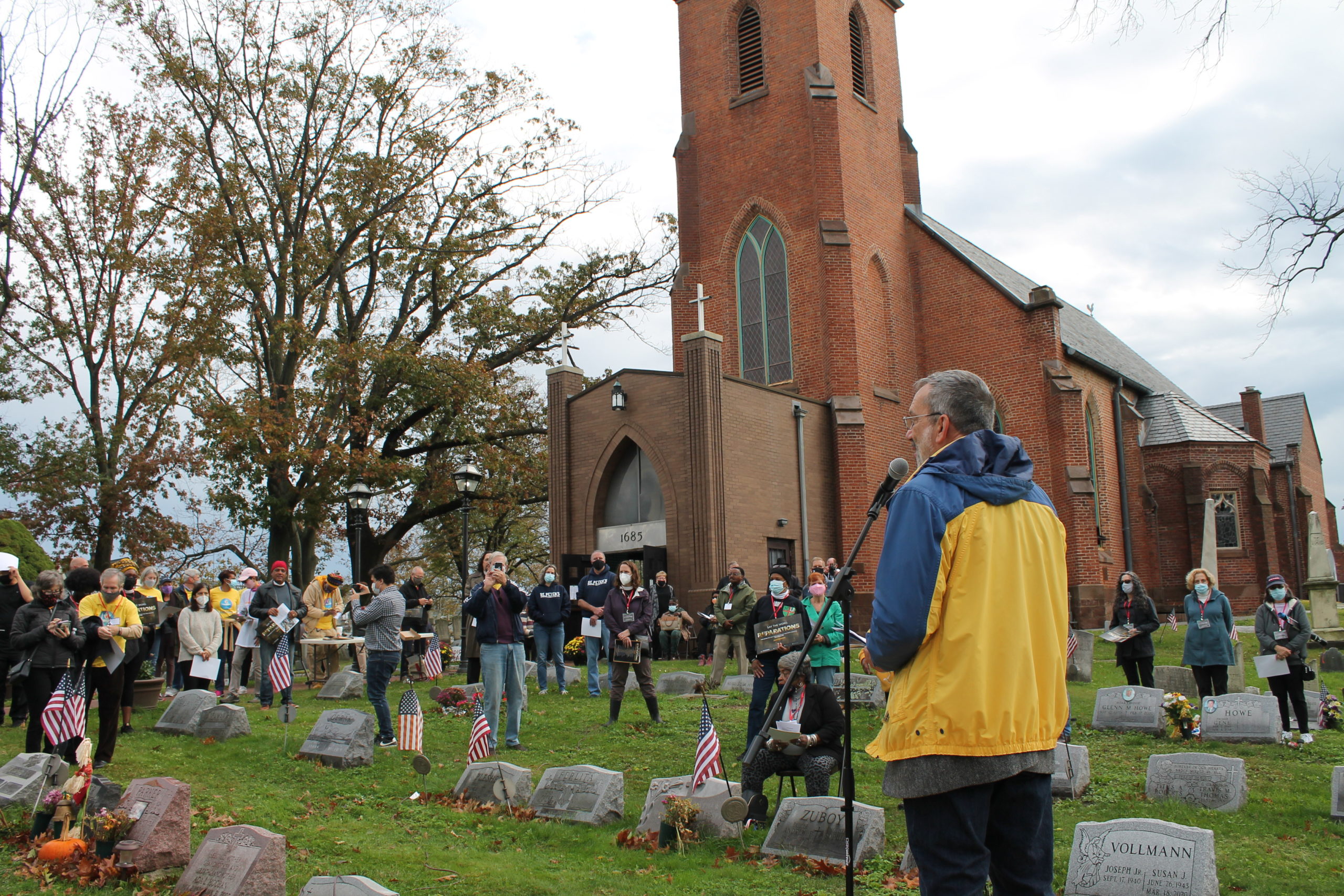 The Rev. Gregory Bezilla, Holy Trinity Episcopal Church, South River, addresses the crowd at the "Say the Word: Reparations" rally on Oct. 30, 2021 at St. Peter's Episcopal Church in Perth Amboy, NJ