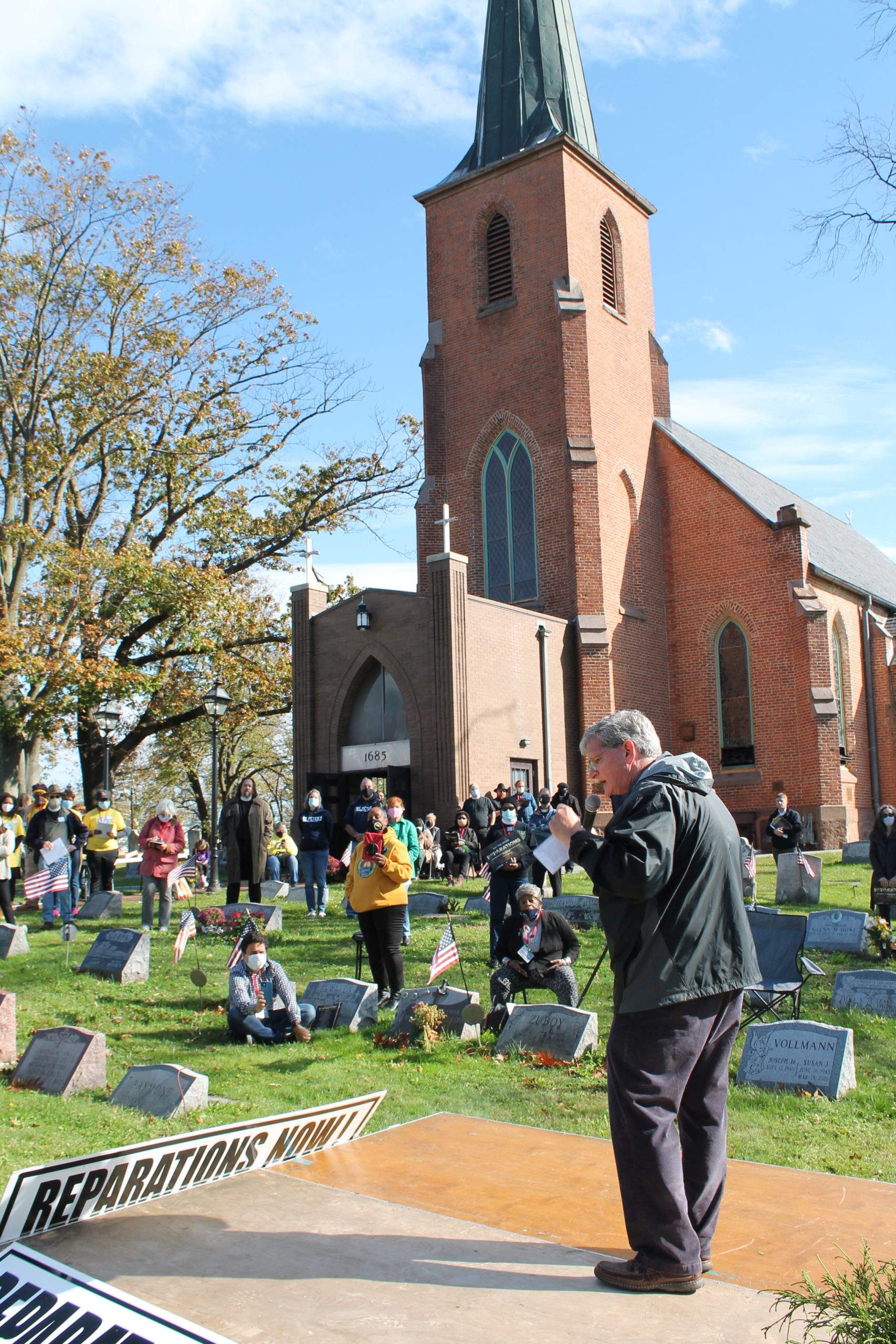 The Right Rev. William H. Stokes, Bishop of the Episcopal Diocese of New Jersey, addresses a crowd of 200 at the "Say the Word: Reparations" rally on Oct. 30, 2021 at St. Peter's Episcopal Church in Perth Amboy, NJ