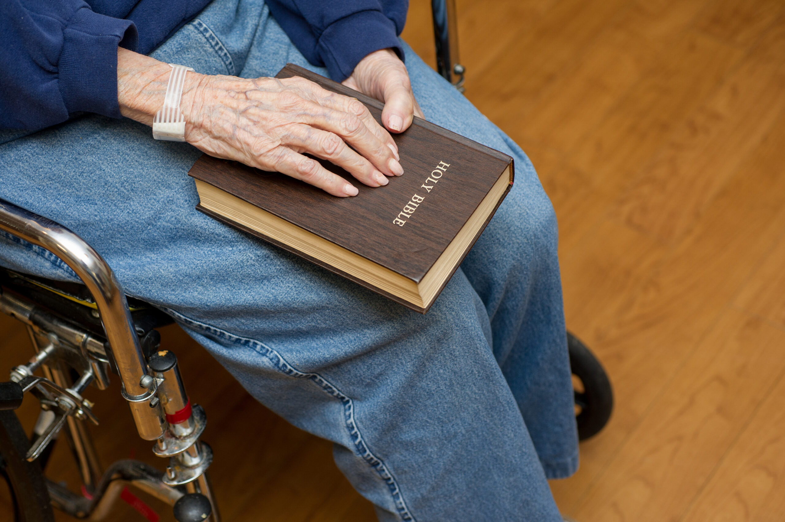 wheelchair and Bible
